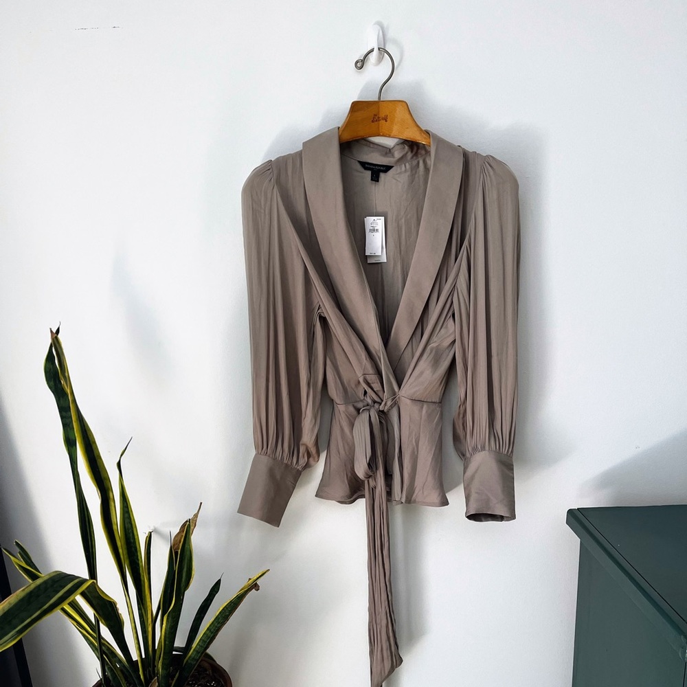 New, never worn Banana Republic round collar wrap shirt. Soft beige color.